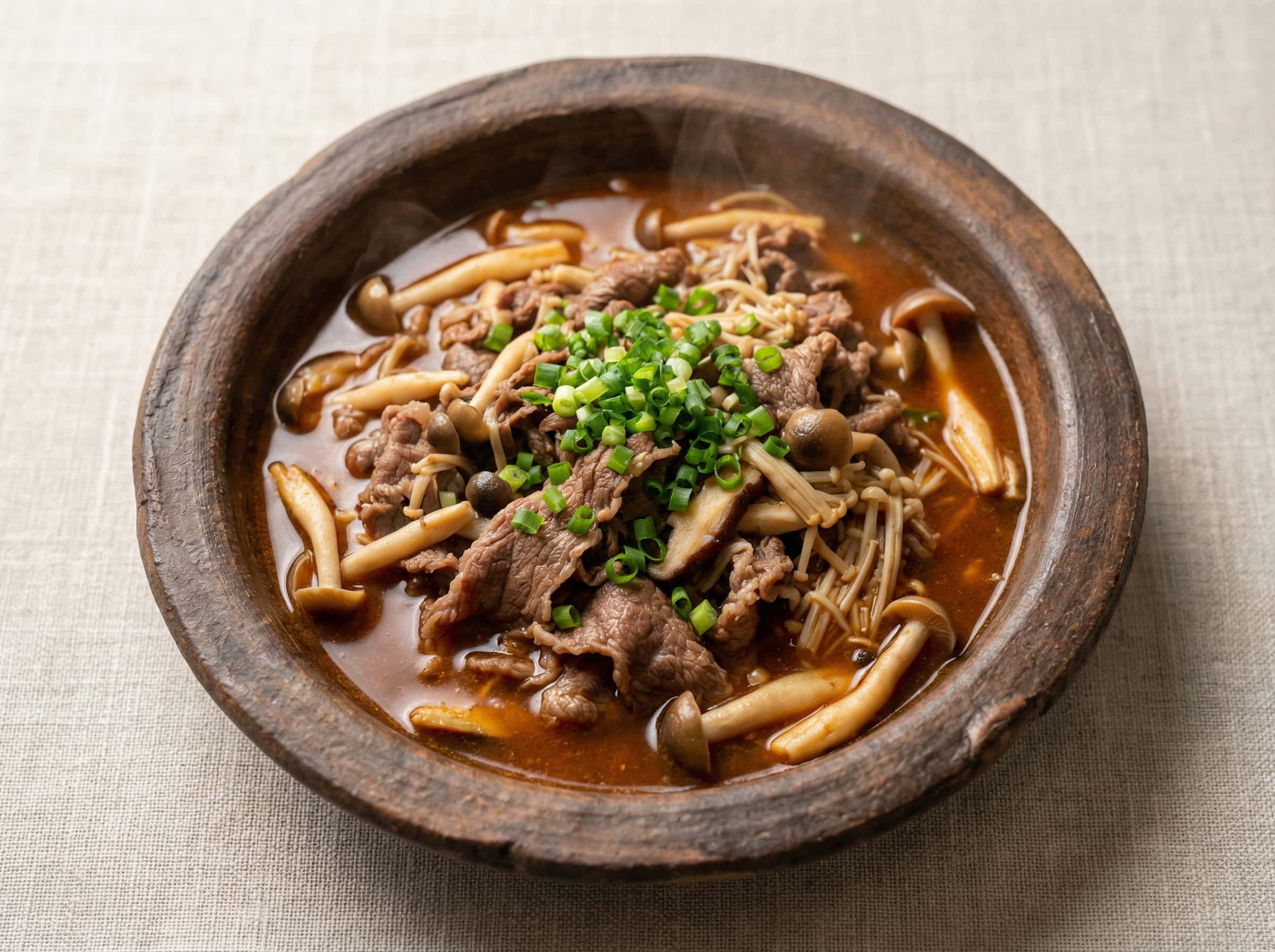 牛薄切りときのこのピリ辛コンソメ蒸し